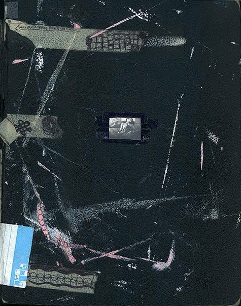 Cover of sketchbook 12B: black board flecked with white and pink paint, collaged strips of patterned paper and a small photo of a white horse at center