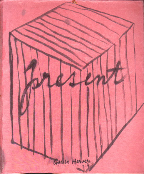 Cover of sketchbook 22A: a striped box drawn in black ink on pink board with 'present' written in cursive across it, signed Auriea Harvey