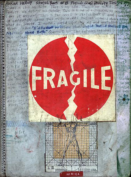 Cover of sketchbook 8 (1990s): silver paint scrawled with dense handwriting around a torn red 'FRAGILE' sticker split by a lightning crack, above a Vitruvian-style figure in a grid